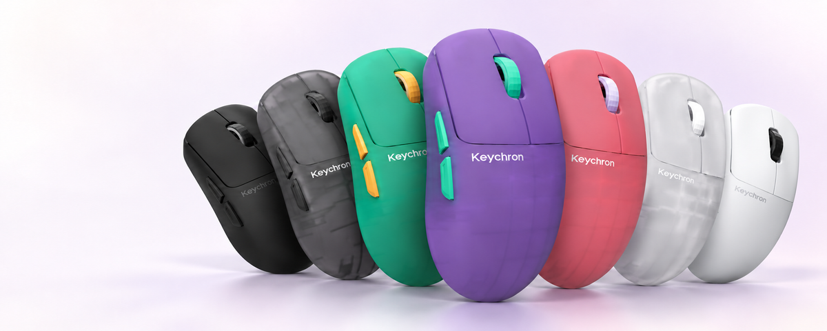 Keychron G6 HE mice in all seven colours, with Frosted Lavender at the centre of the fan